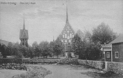 Kyrka och klockstapel vid vattendrag
Nyckelord: Kyrka Klockstapel