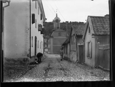 Gatubild med byggnader..
Nyckelord: Gata Kullersten