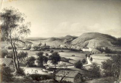 Foto av tavla med stadsvy
