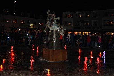 Ljusfontän på torg
